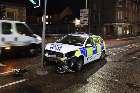 Police car crashes into traffic lights in Perth near ...