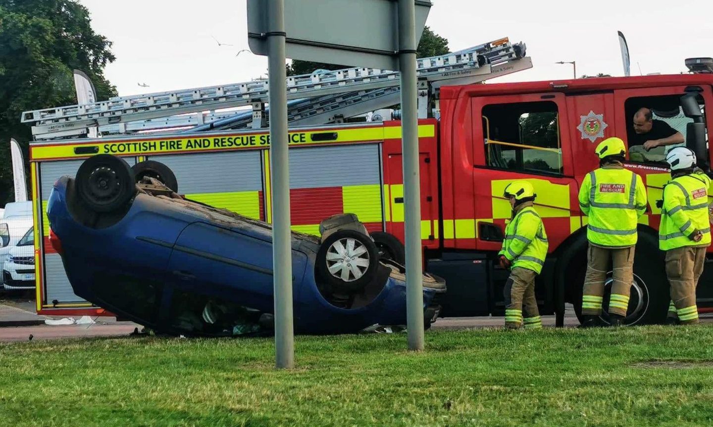 Car Overturns After Crash On Dundee Roundabout