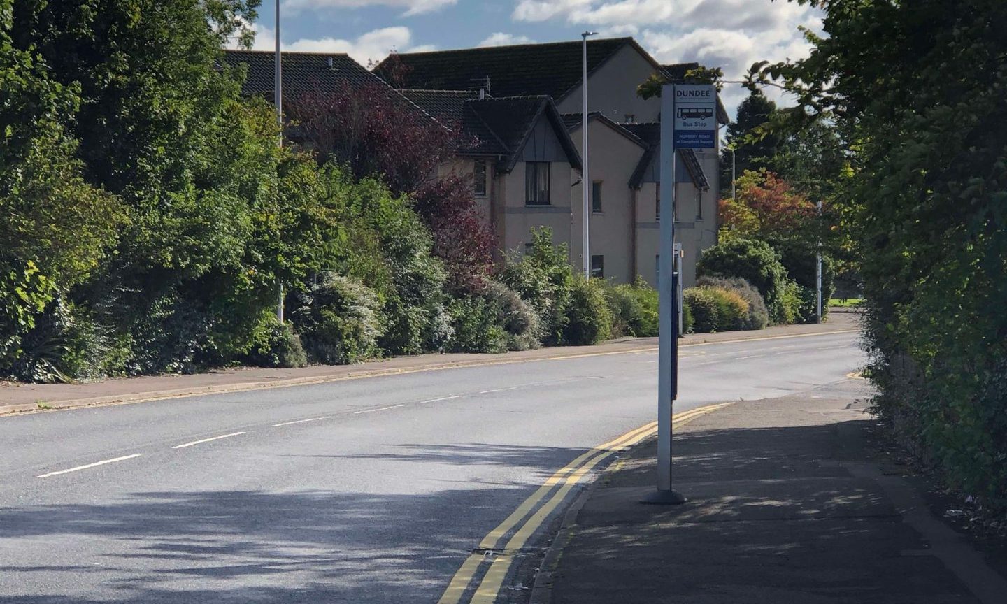 Man dies at bus stop near Dundee shops