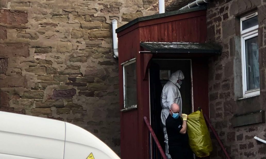 Forensics officers at Dundee house after cannabis farm found