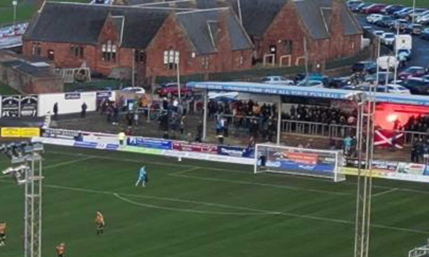 Boy charged after throwing flare on pith at Arbroath FC game